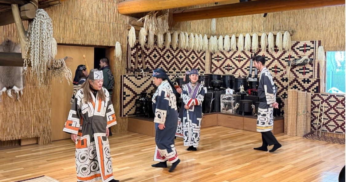 Figure 15. An Ainu family demonstrating traditional songs